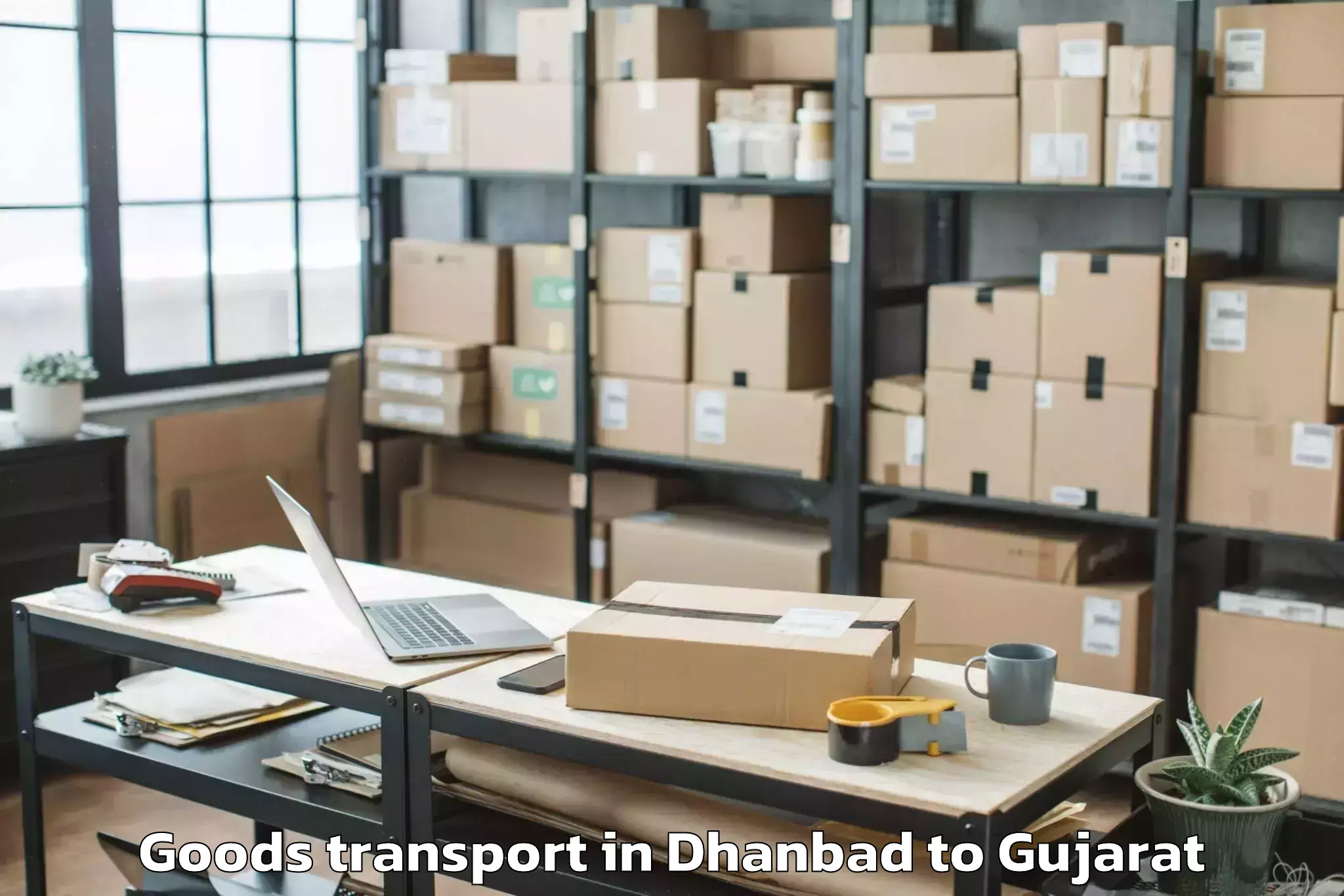 Get Dhanbad to Lakulish Yoga University Ahmed Goods Transport